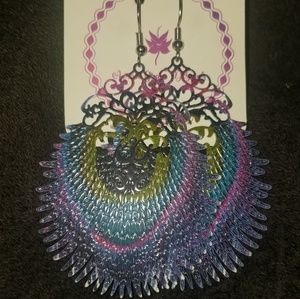 Die cut metal earrings in a peacock design